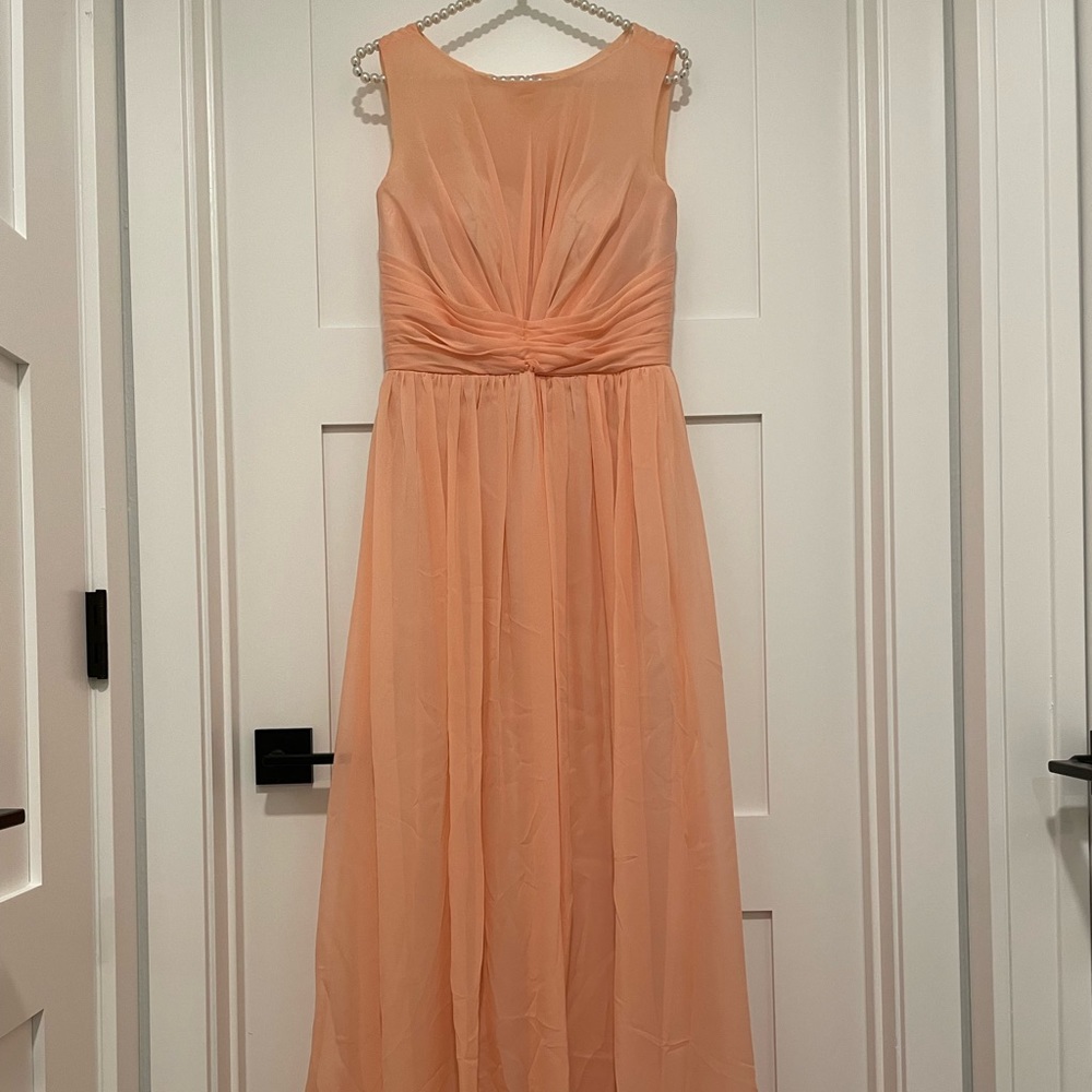 Peach chiffon sleeveless maxi bridesmaid dress with pleated empire waist